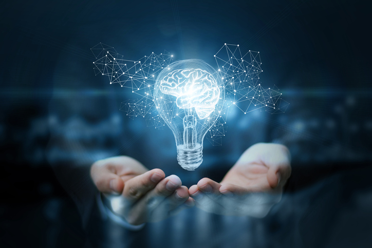 LIght bulb with a glowing brain inside